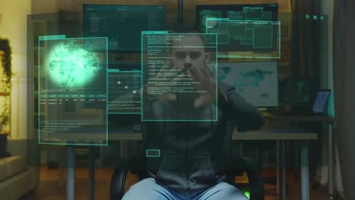 Man Interacts with Futuristic Transparent Computer Display