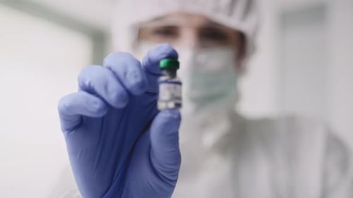Video of coronavirus remedy in hands of a doctor. Shot with RED helium camera in 8K