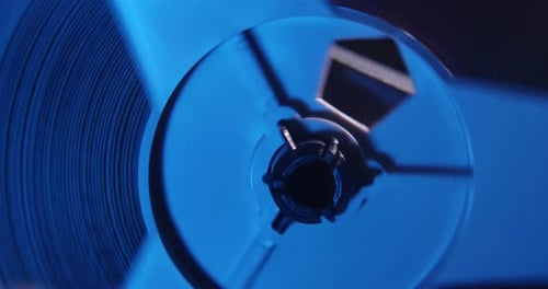 Vintage Reel to Reel Tape Deck Spinning Close Up