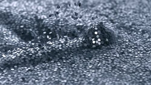 Wellen in Wasser gefüllt mit Glitzer, Zeitlupe