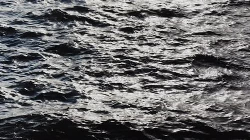 Sunlight Gleaming on Deep Ocean Waves