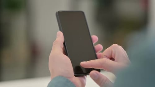 Middle Aged Man using Smartphone