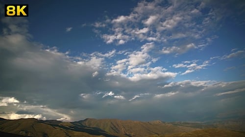 Cloudscape Time Lapse Over Mountainous Landscape