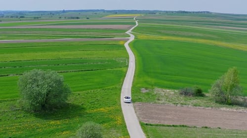 Driving A Car On A Dirt Road