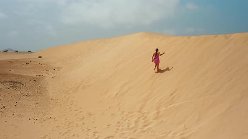 Girl Teenager Walking in Sand Desert