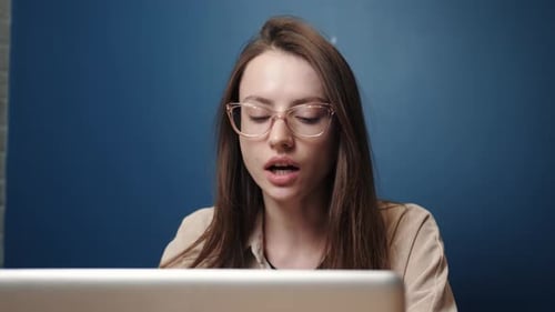 Professional Woman Speaking During a Video Conference