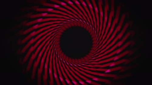 Red swirling moving tunnel on black background
