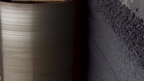 Road Roller Compacting Fresh Black Asphalt