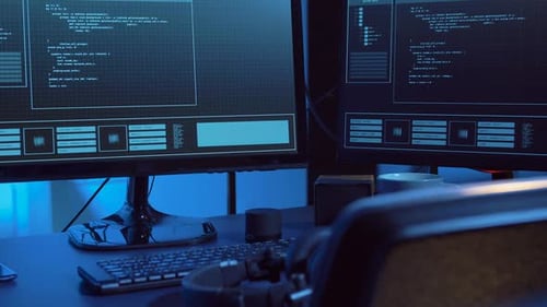 Computer Monitors Displaying Lines of Code