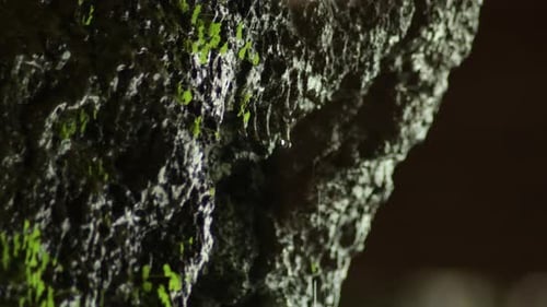 Water Falling in a Rock in a Cave