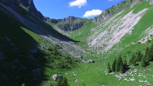 Aerial drone view of a scenic mountain valley.