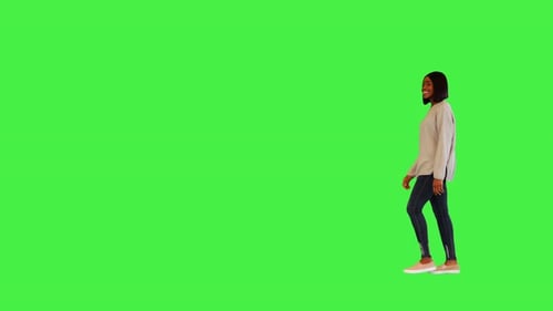 Young Woman Walking Across Green Screen