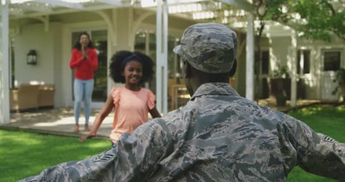 Military Father Returns Home to Joyful Family