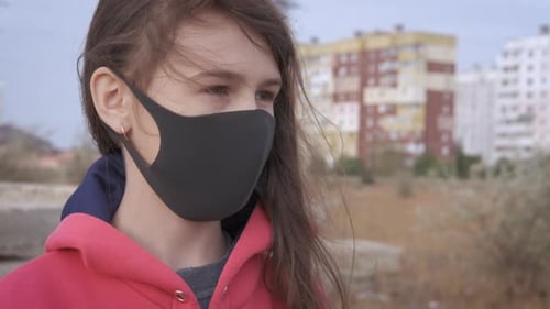 Person Wearing Protective Mask Outside