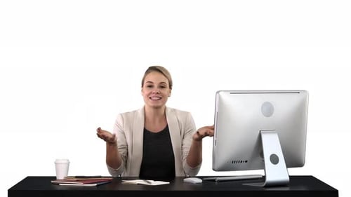 Woman Gives Presentation at Desk with Computer