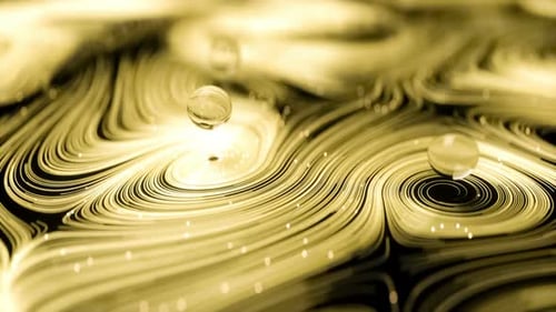 Abstract Fluid Motion with Glowing Golden Particles and Orbs