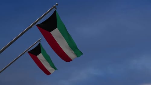 Kuwait Flags Waving on Poles Against Blue Sky