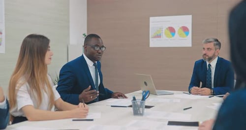 Business Meeting in Modern Office Conference Room