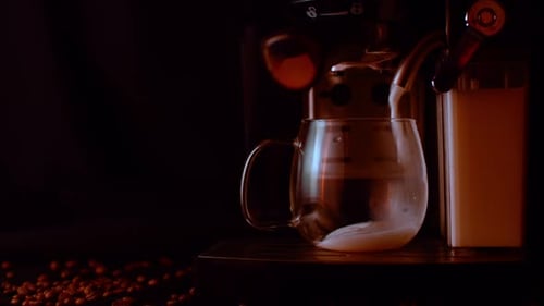 Espresso Machine Pouring Milk into Glass Mug