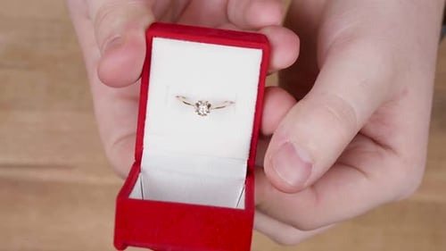 Gold Ring Presented in Red Velvet Ring Box