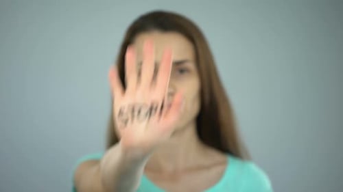 Person with Stop on Hand