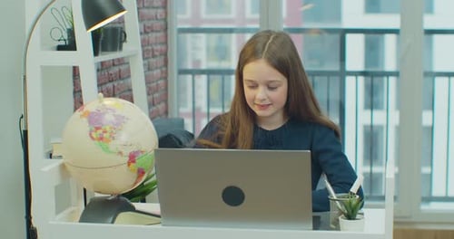 Distance Learning Little Girl Schoolgirl Studying Online From Home Using Laptop School Student in