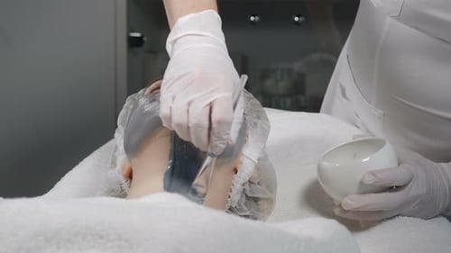 Close-up Shot of Beautician Applying Beauty Mask on Female Neck. Cosmetology, Face Care Concept