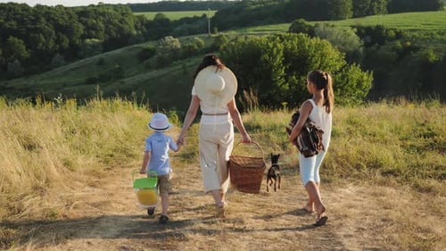 Family Walks on Path Through Rural Countryside
