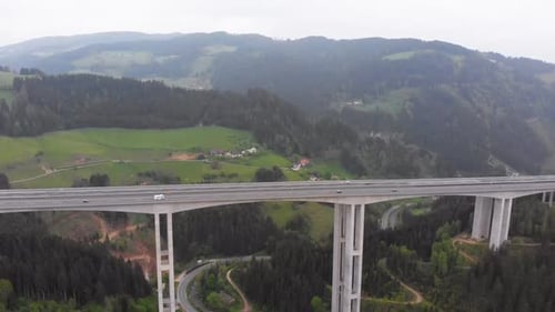 Aerial View of the Highway Viaduct on Concrete Pillars in the Mountains
