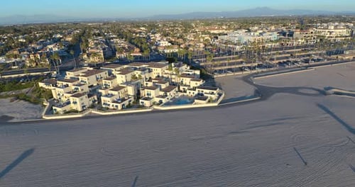 Aerial View of Beach Homes and Ocean at Sunrise