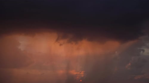Dramatic Sunset Time Lapse with Billowing Dark Clouds