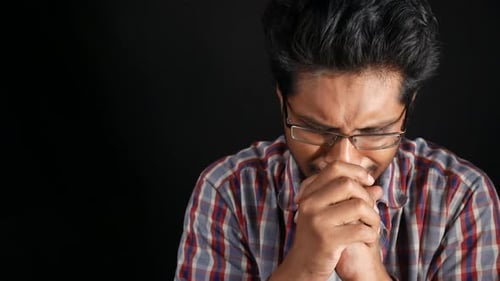 Upset Man Crying Isolated on Black
