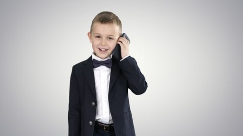 Boy in Blazer Talking on Phone