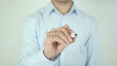 Man Writes 'Employee' on Transparent Surface