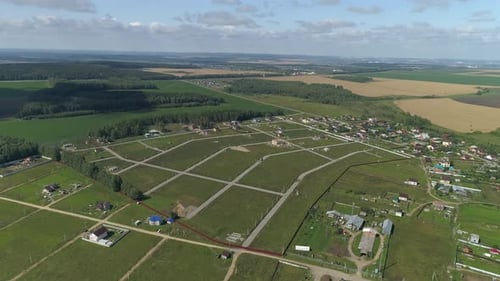 Aerial view of vacant land plots in a new cottage settlement 14