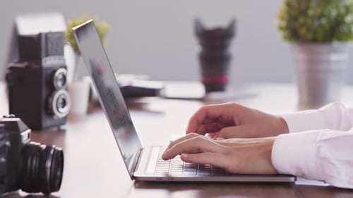 Man Working On Laptop (2K)