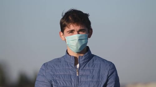 Teenager Wearing Mask Outside During Pandemic