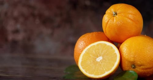 Naranjas enteras y medias con vapor frío