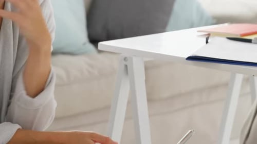 Woman Talking to Therapist and Taking Notes