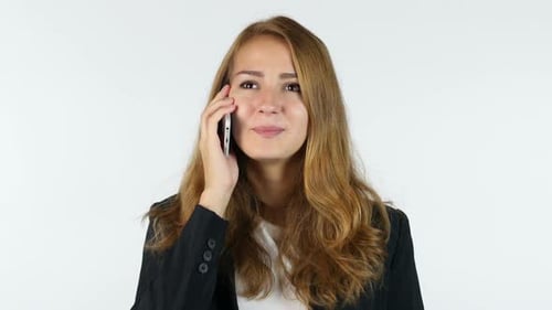 Woman Talking on a Cell Phone, Studio Shot