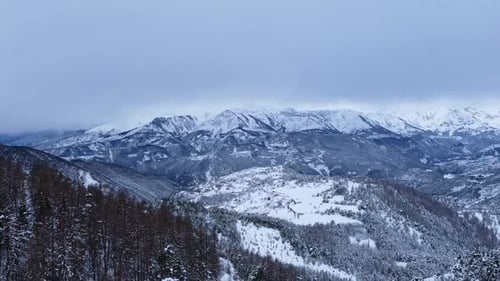 Scenic Mountains Covered in Snow on a Winter Day