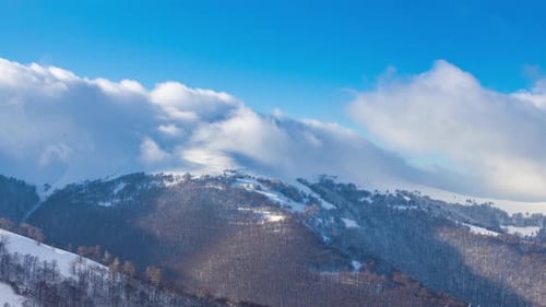 Scenic Aerial View of High Mountains Peaks Range