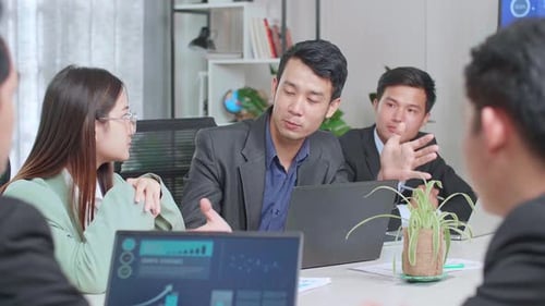 Colleagues Brainstorming in Modern Office Conference Meeting