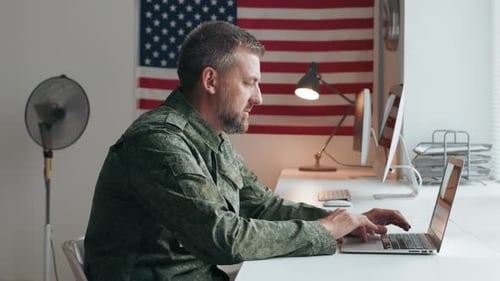 U.S. Army Officer Working at Desk