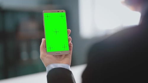 Woman Holding Smartphone with Chroma Key Screen