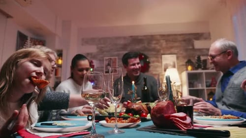 Family Celebration Dinner With Toasting and Holiday Cheer