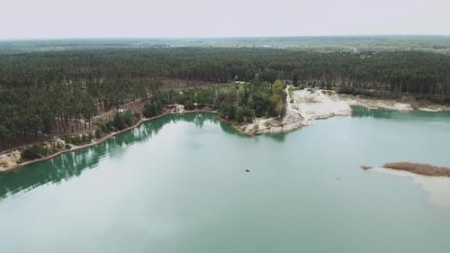 Aerial View of Lake Pine Forest on the Background