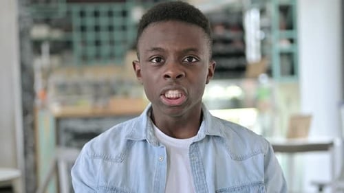 Young Adult Male Expressing Shock and Surprise