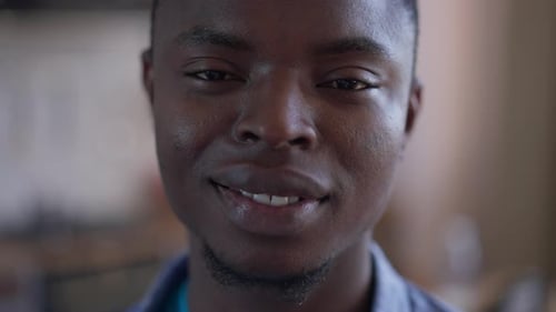 Smiling Young Man Close Up Headshot Indoors