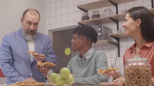 Office Workers Having Bite and Talking